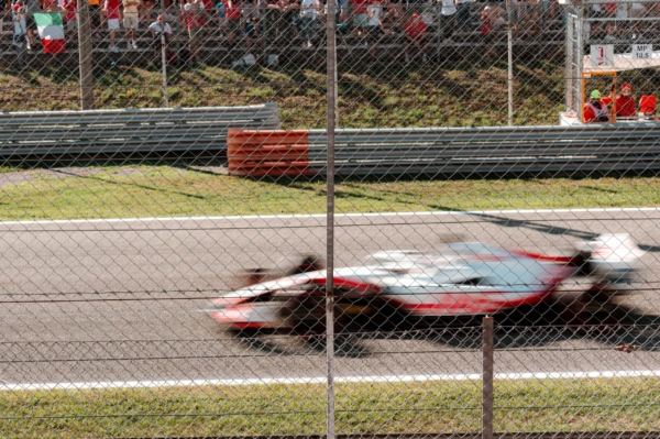 F1 car racing on track in Monza 2022