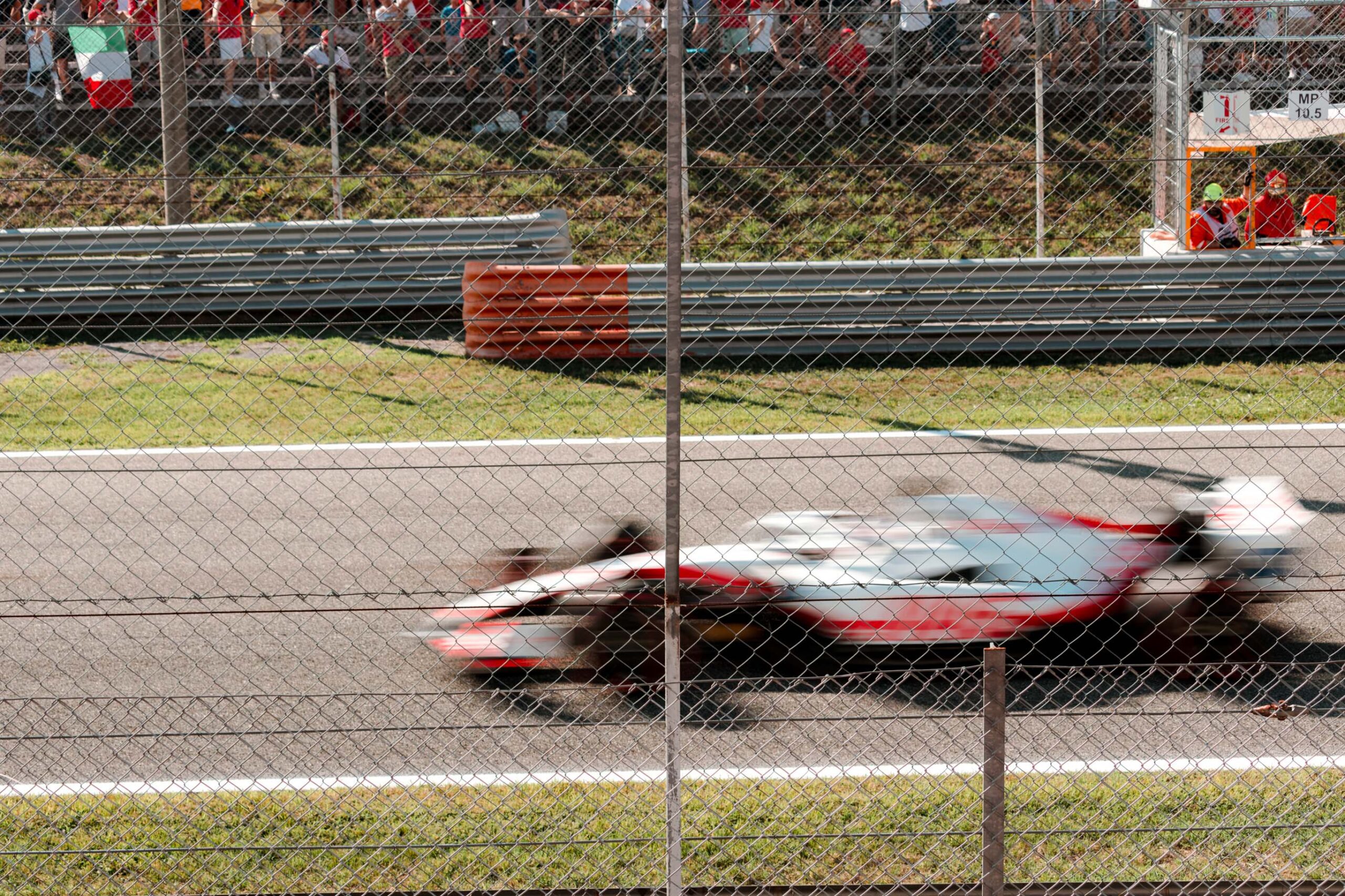 F1 car racing on track in Monza 2022