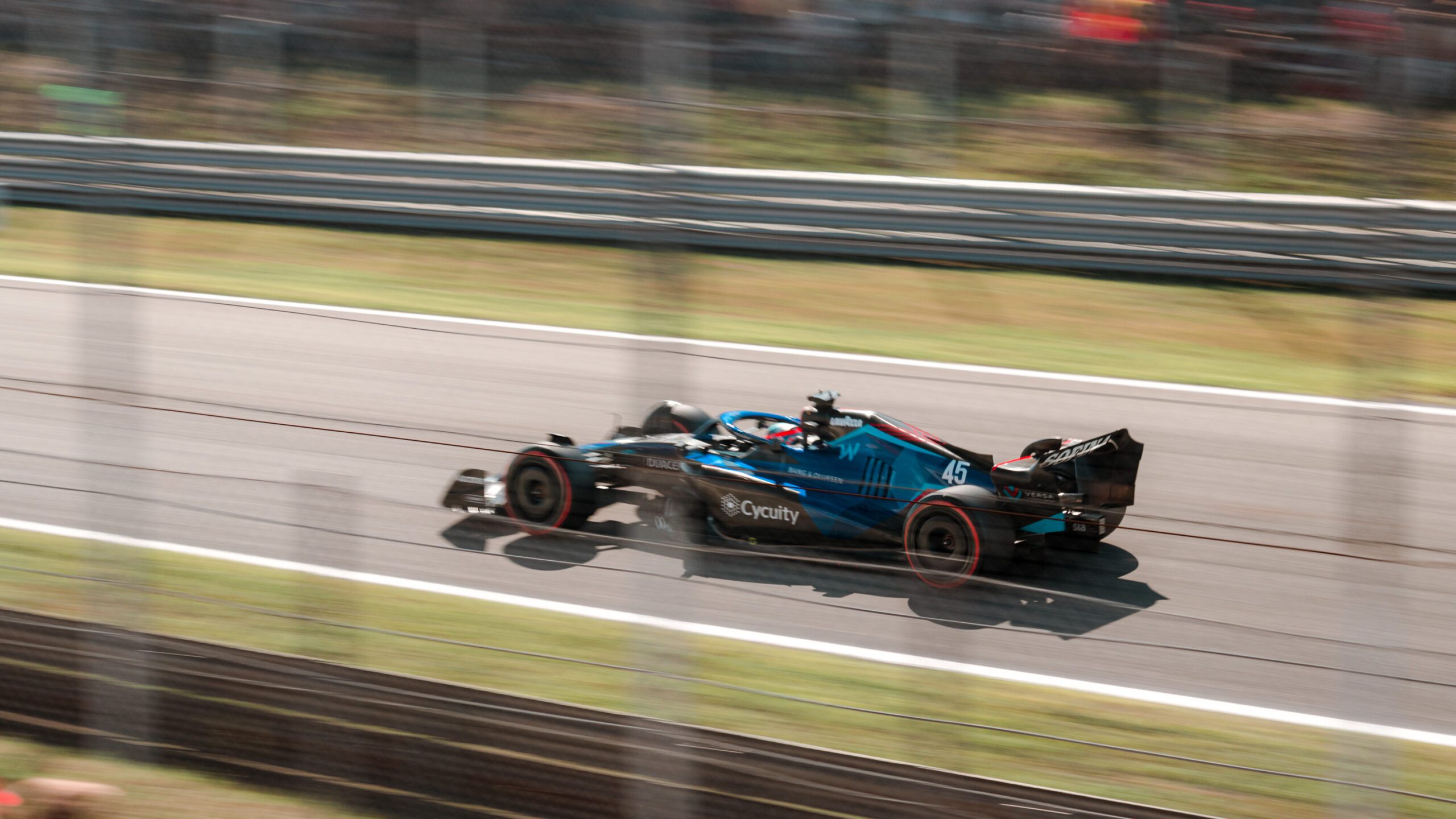 F1 car racing on track in Monza 2022