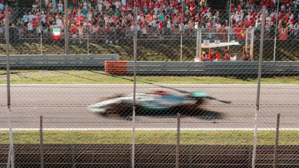 F1 car racing on track in Monza 2022