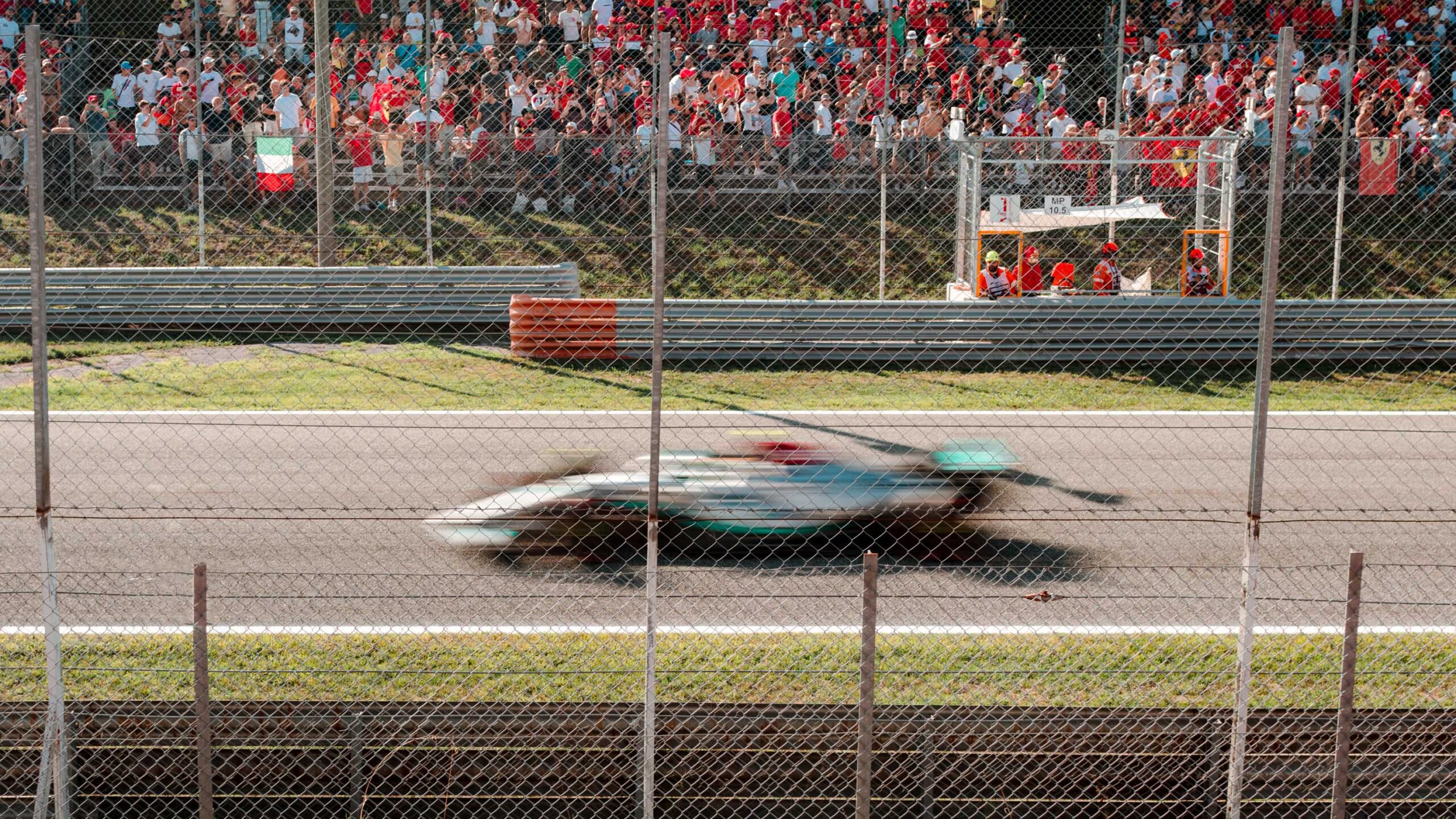 F1 car racing on track in Monza 2022