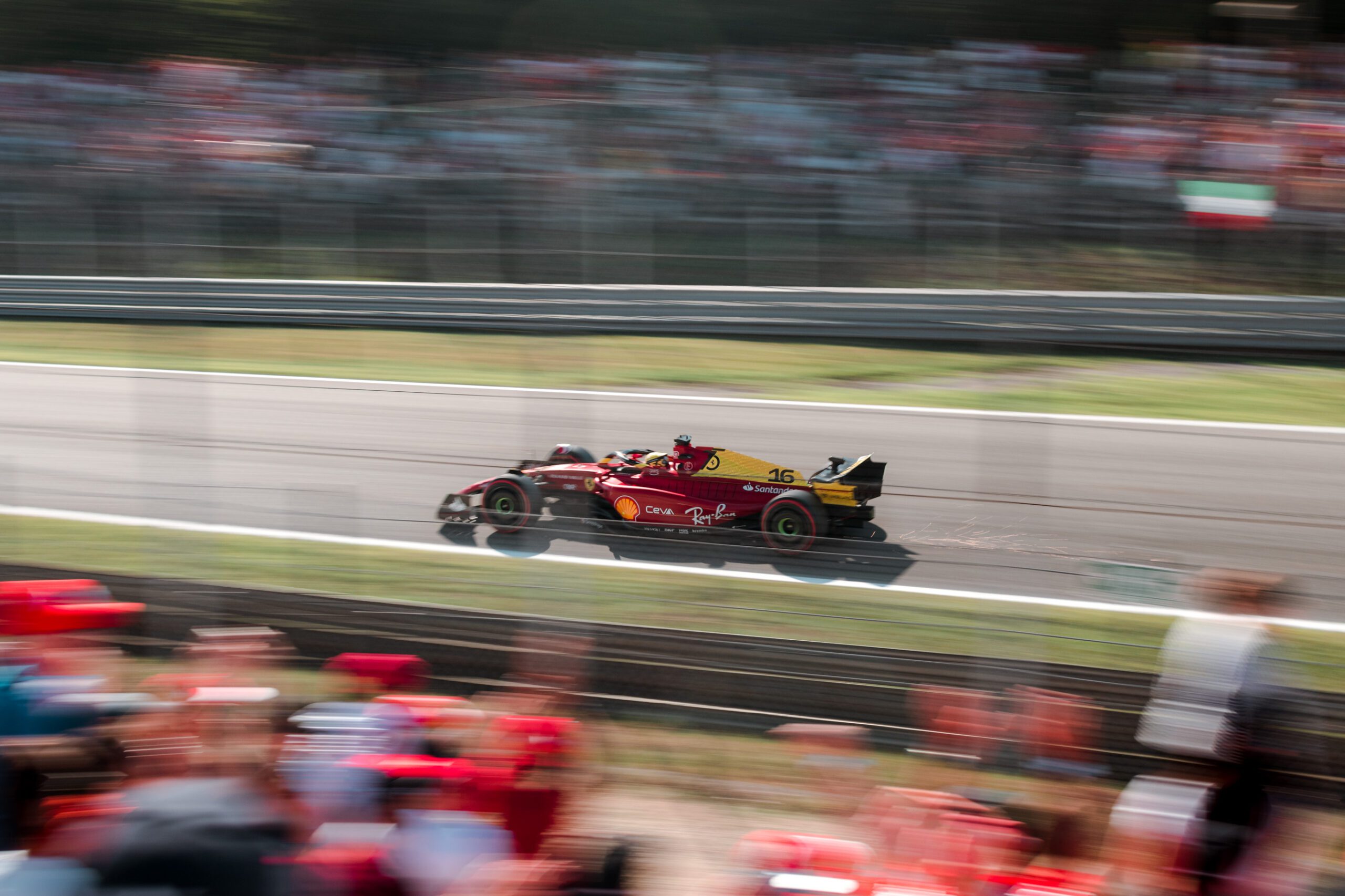 F1 car racing on track in Monza 2022