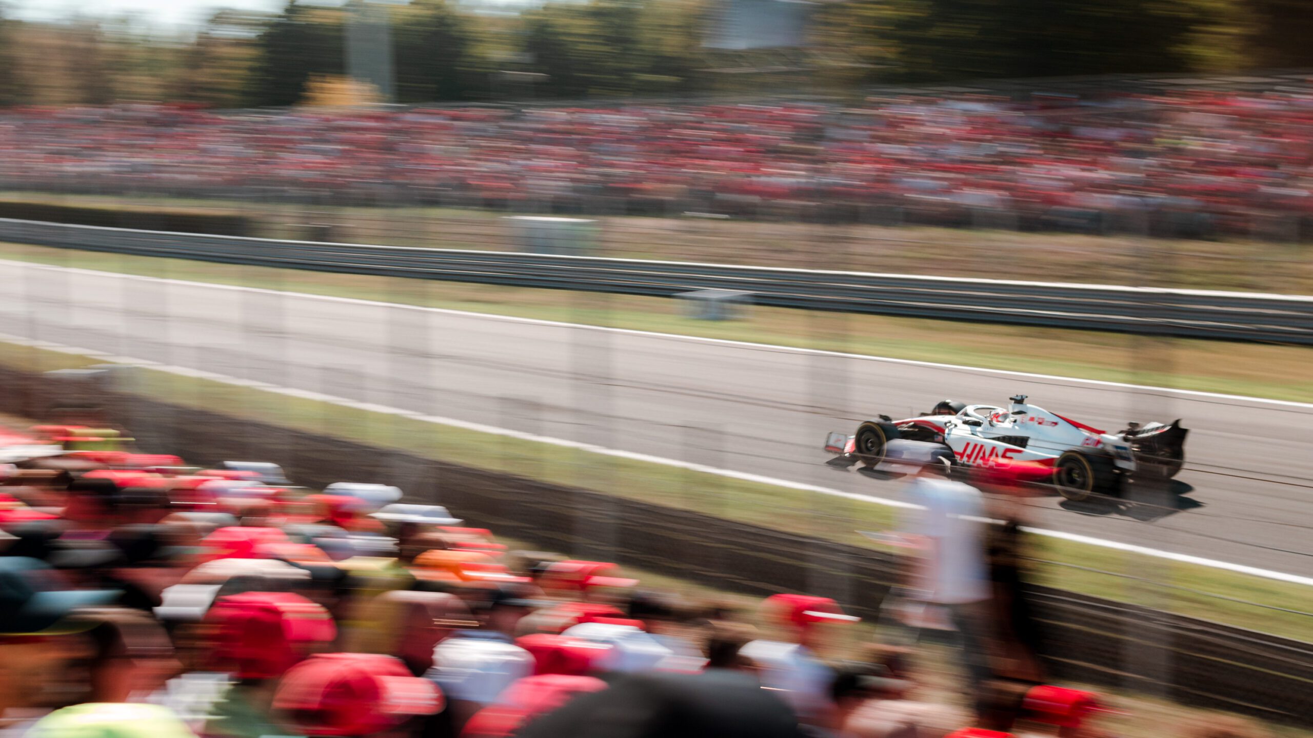 F1 car racing on track in Monza 2022