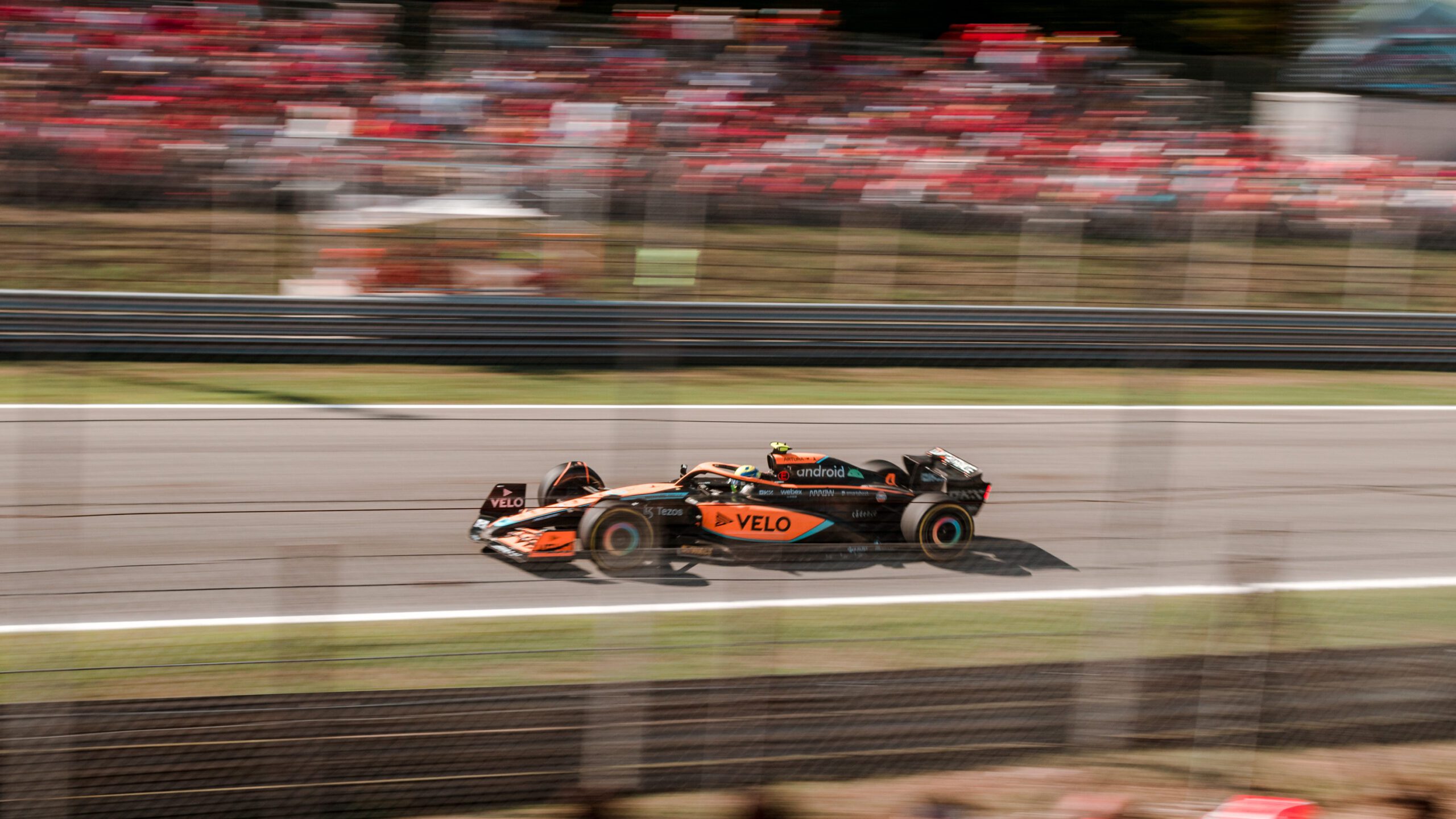 F1 car racing on track in Monza 2022