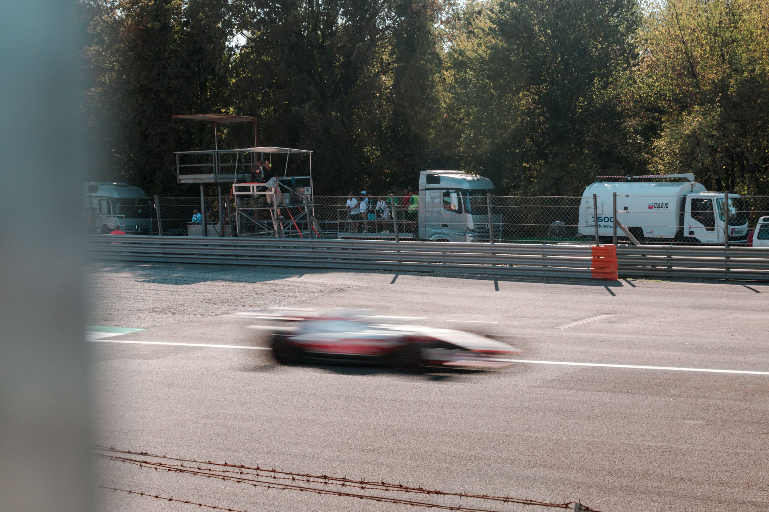 F1 car racing on track in Monza 2022