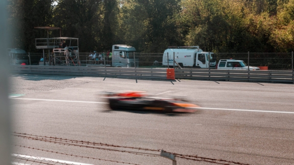 F1 car racing on track in Monza 2022