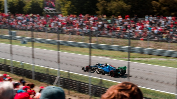 F1 car racing on track in Monza 2022