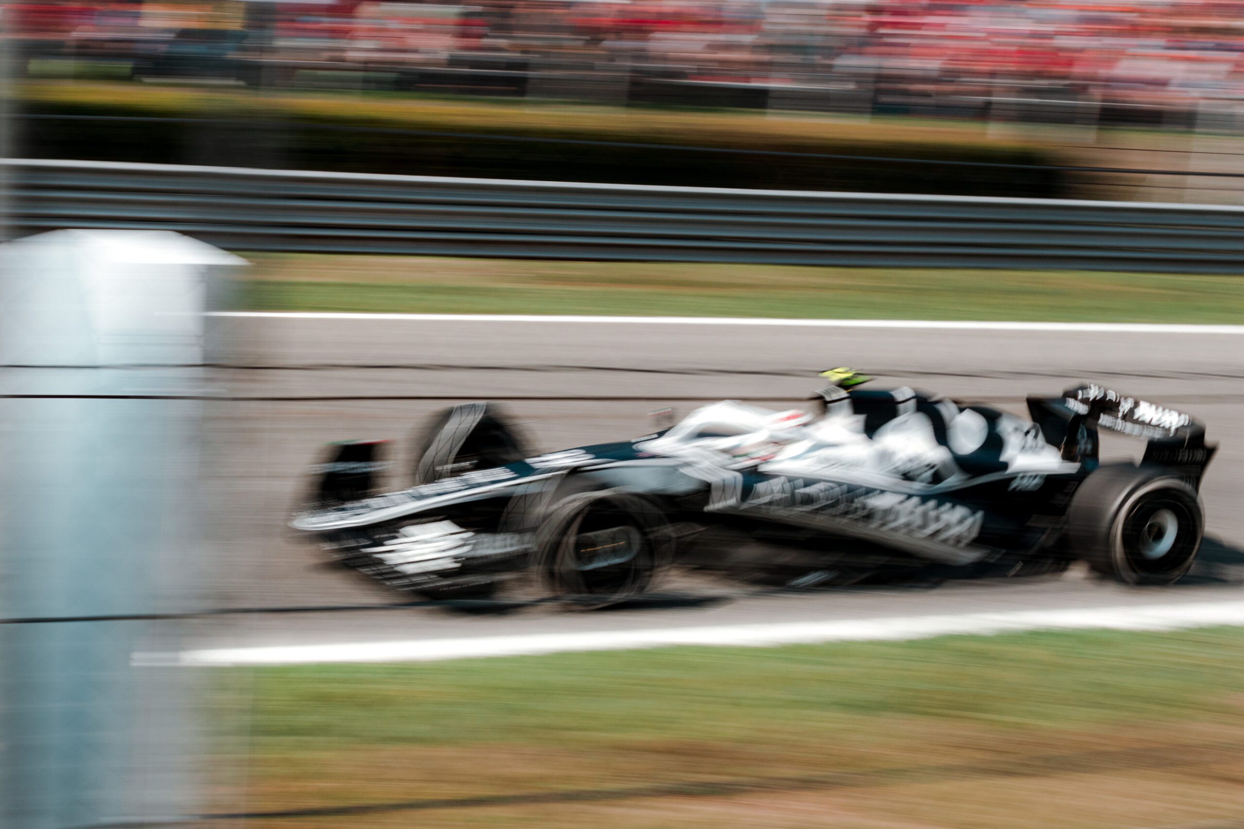 F1 car racing on track in Monza 2022