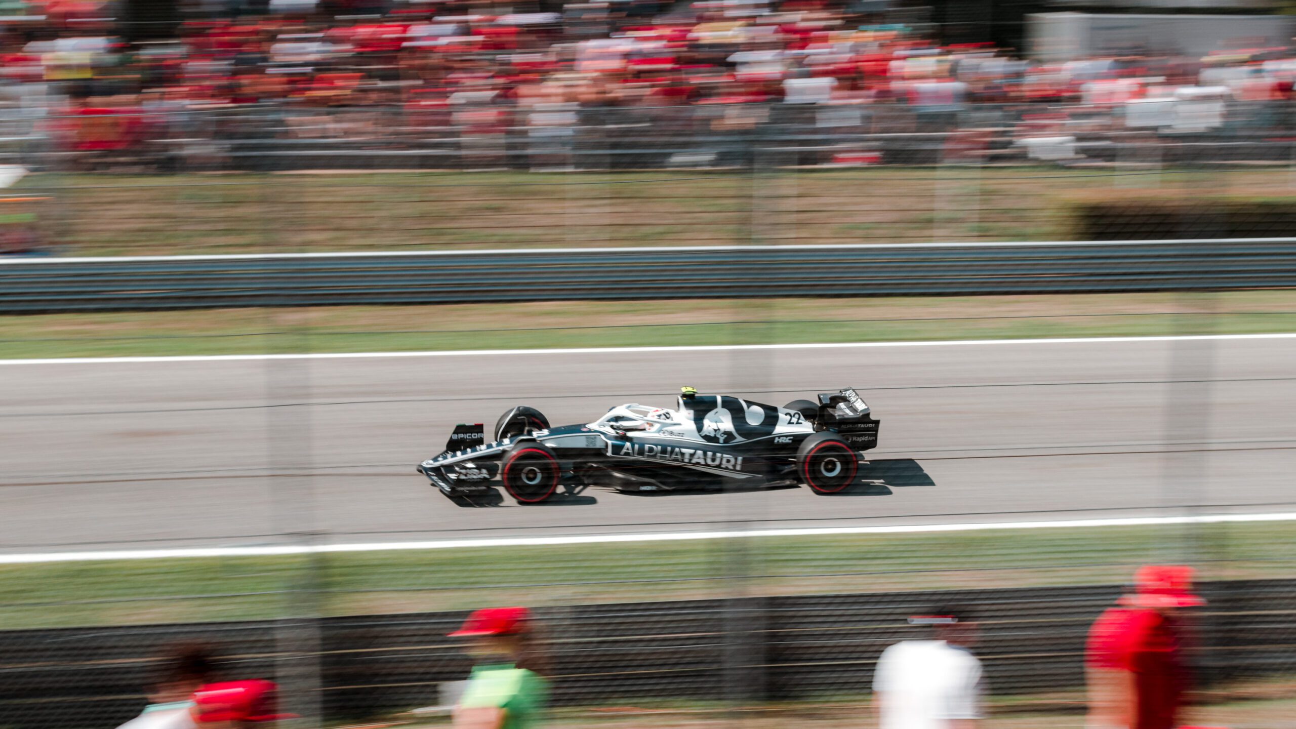 F1 car racing on track in Monza 2022