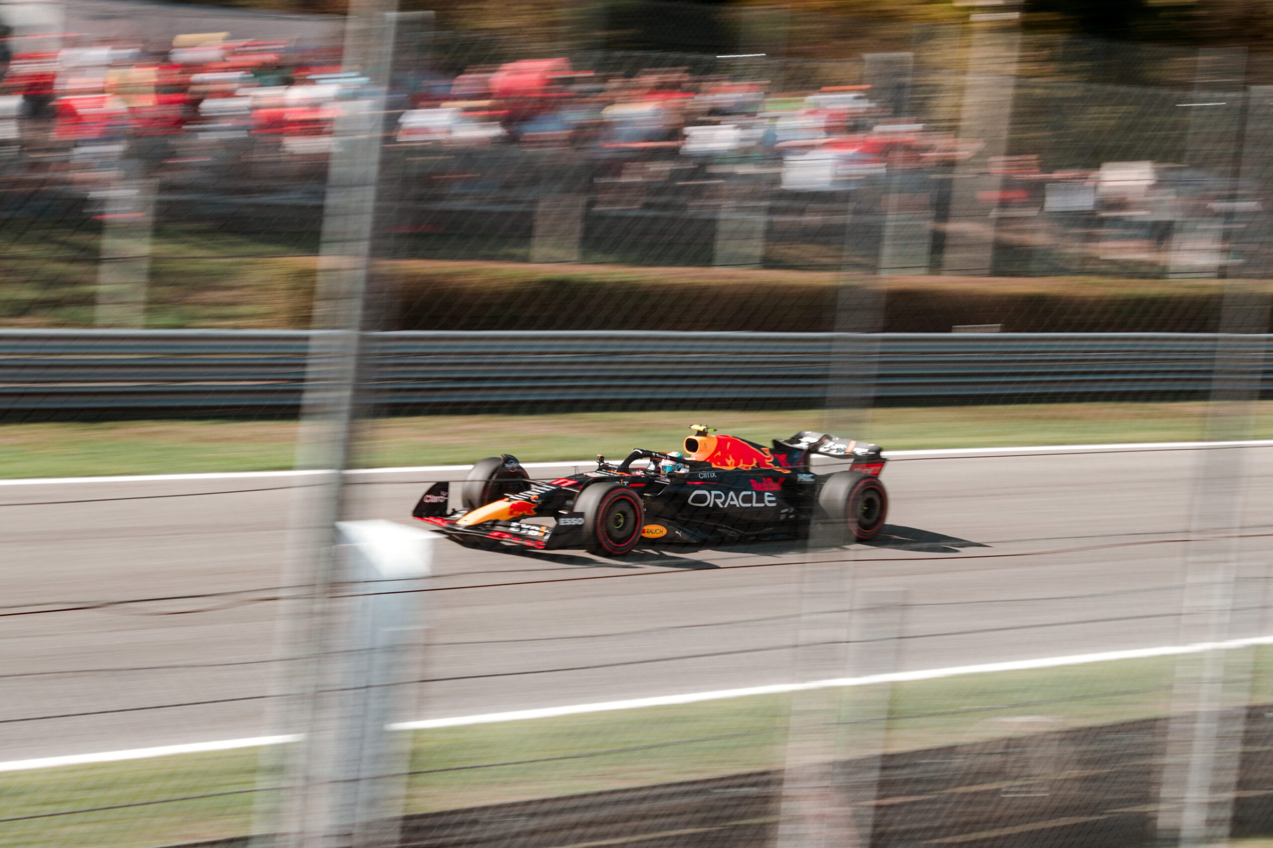 F1 car racing on track in Monza 2022