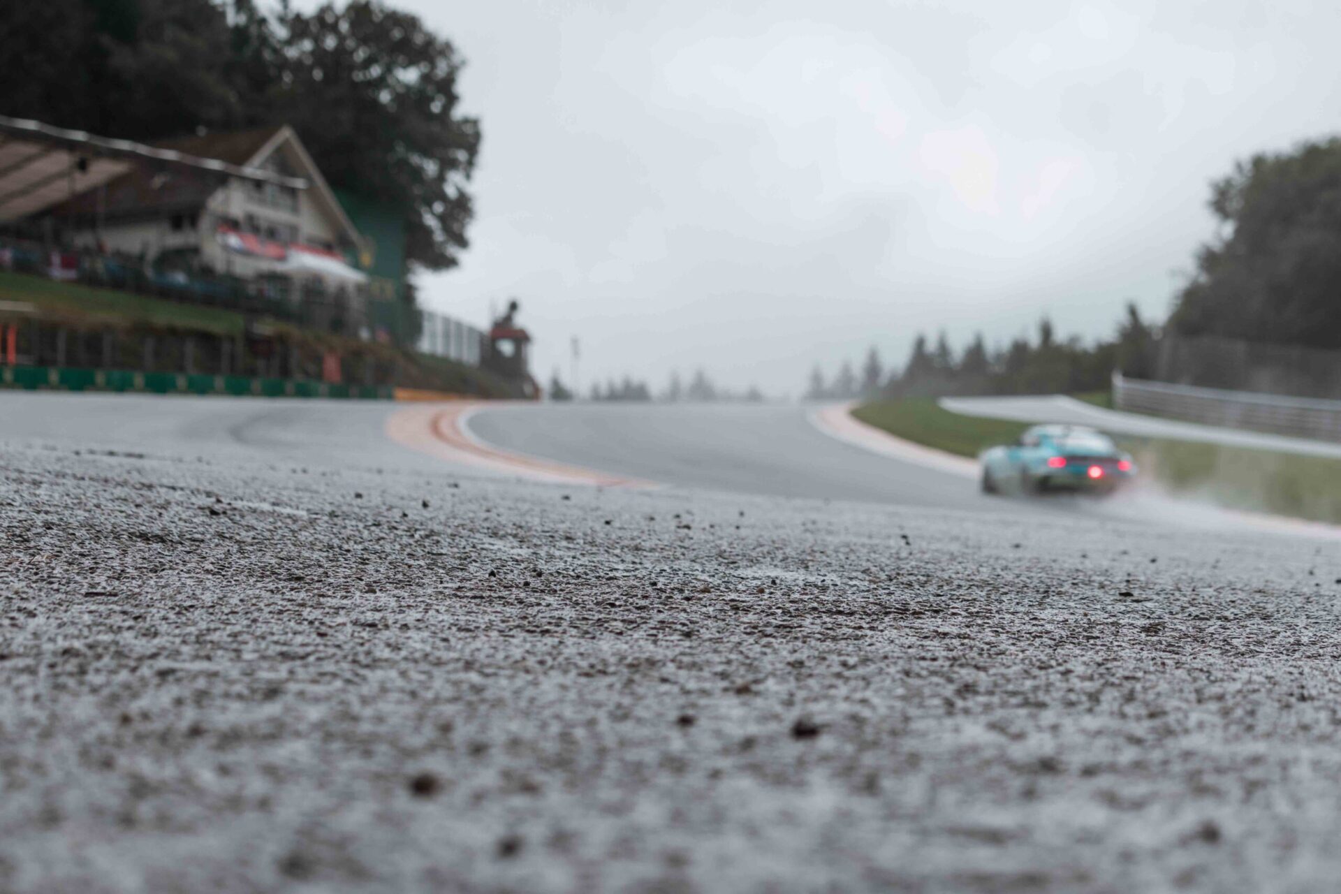 Porsche car on Eau Rouge