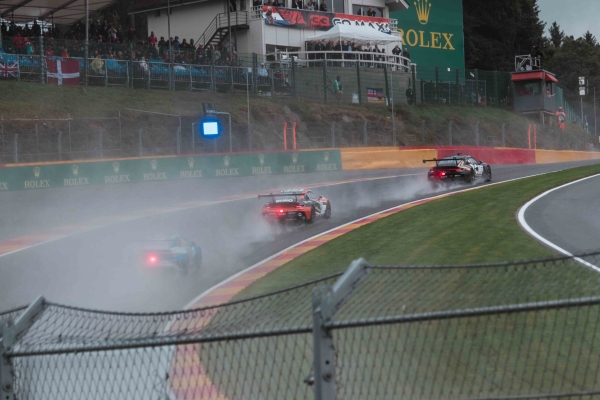 Porsche cars on Eau Rouge