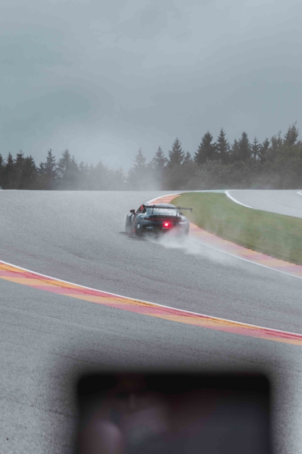 Porsche car on Eau Rouge
