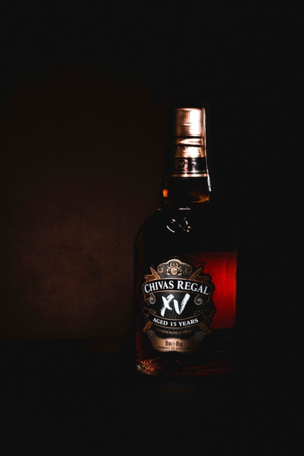 Glass bottle in a professional studio photoshoot