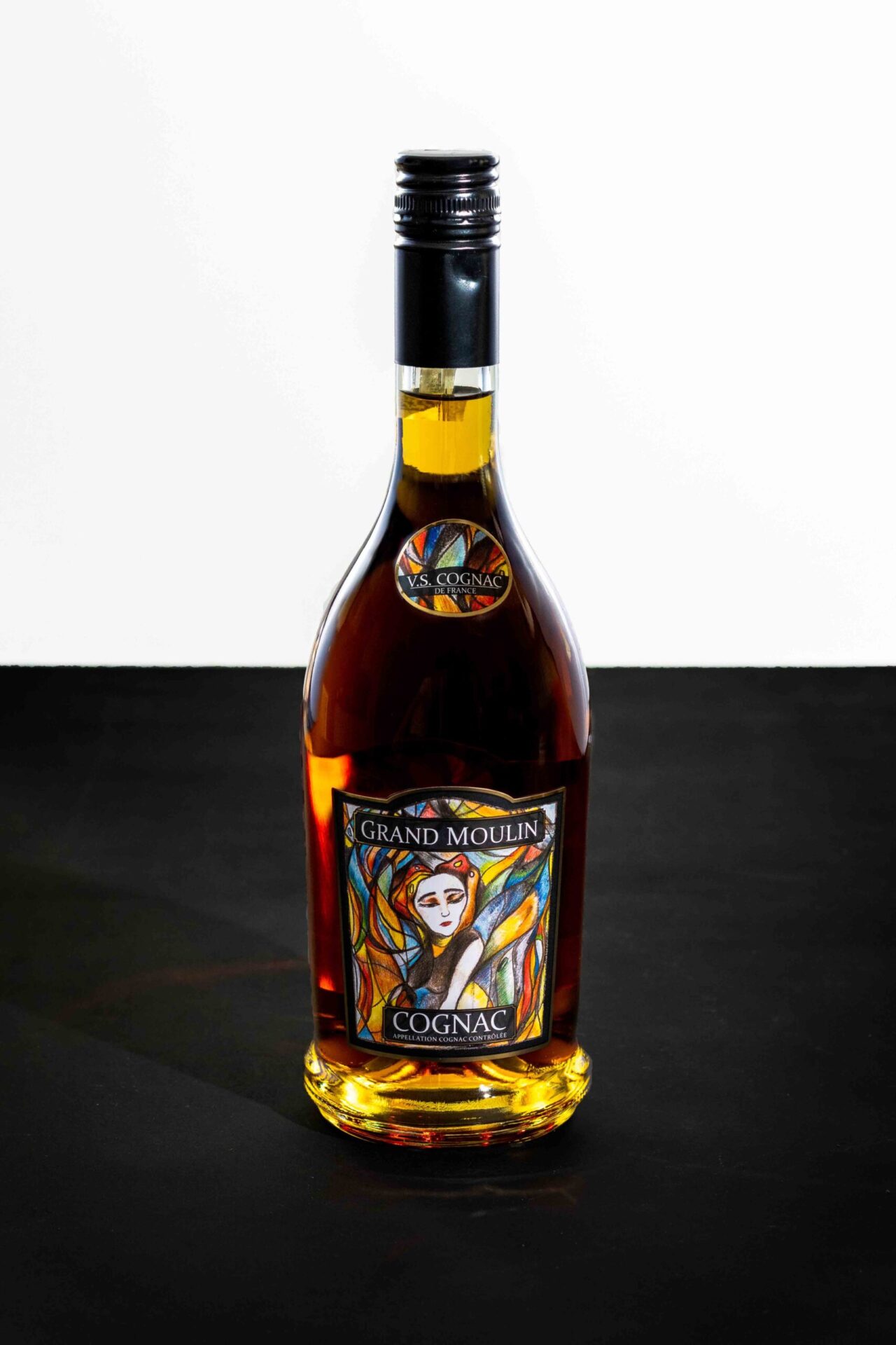 Glass bottle in a professional studio photoshoot