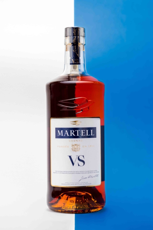 Glass bottle in a professional studio photoshoot